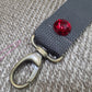 Charcoal + ruby bag strap